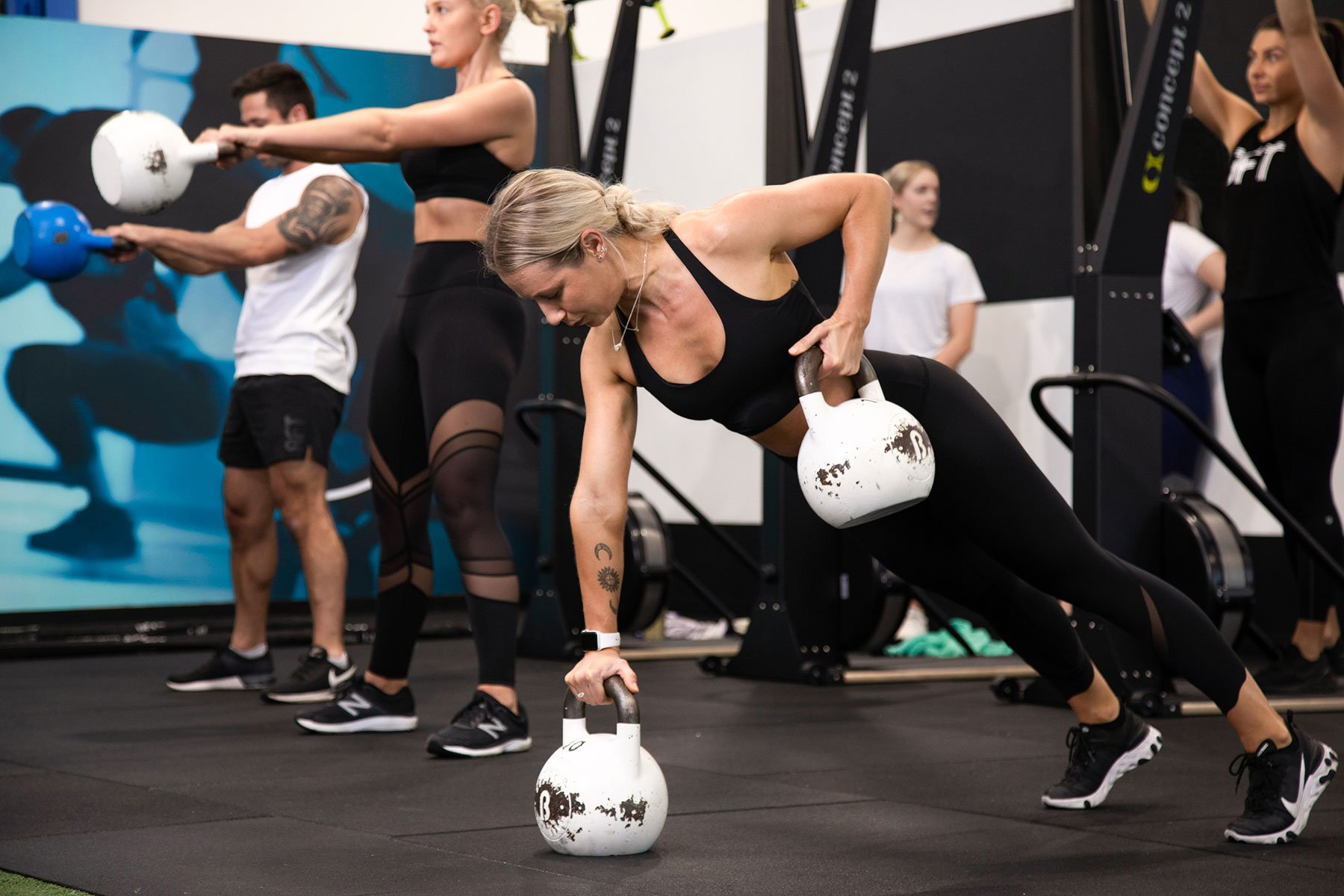 People working out with kettlebells